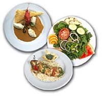 Imatge de tres plats amb menjar